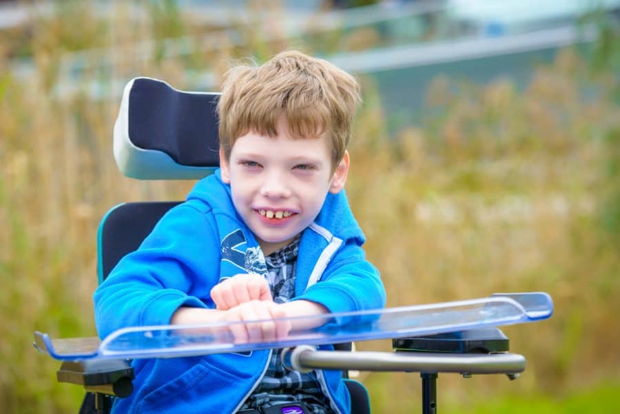 Joseph Big Smile in Chair