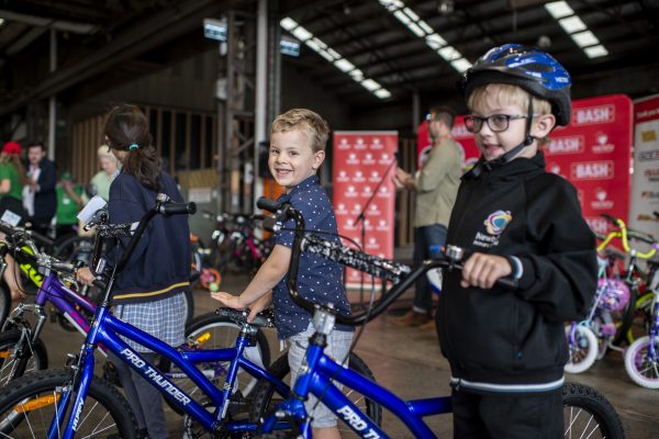 Boy on bike smiling