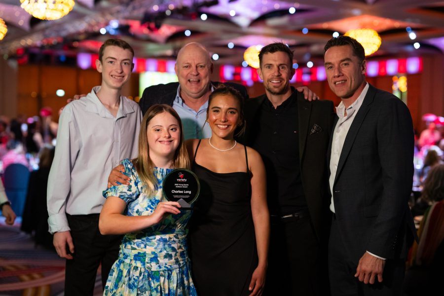 Charlee Lang with her Variety Young Sports Achiever Award, with Variety Heart Scholars Kye Kelly (basketball) and Rita De Bon (equestrian), and AFL legends - Billy Brownless, Brett Deledio and Anthony Koutoufides.