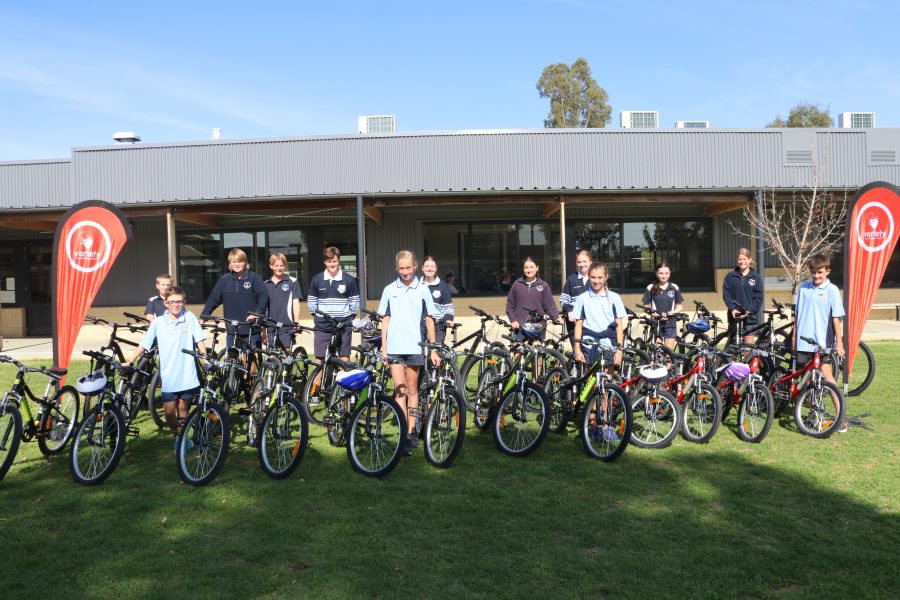 Some students posing on the bike display